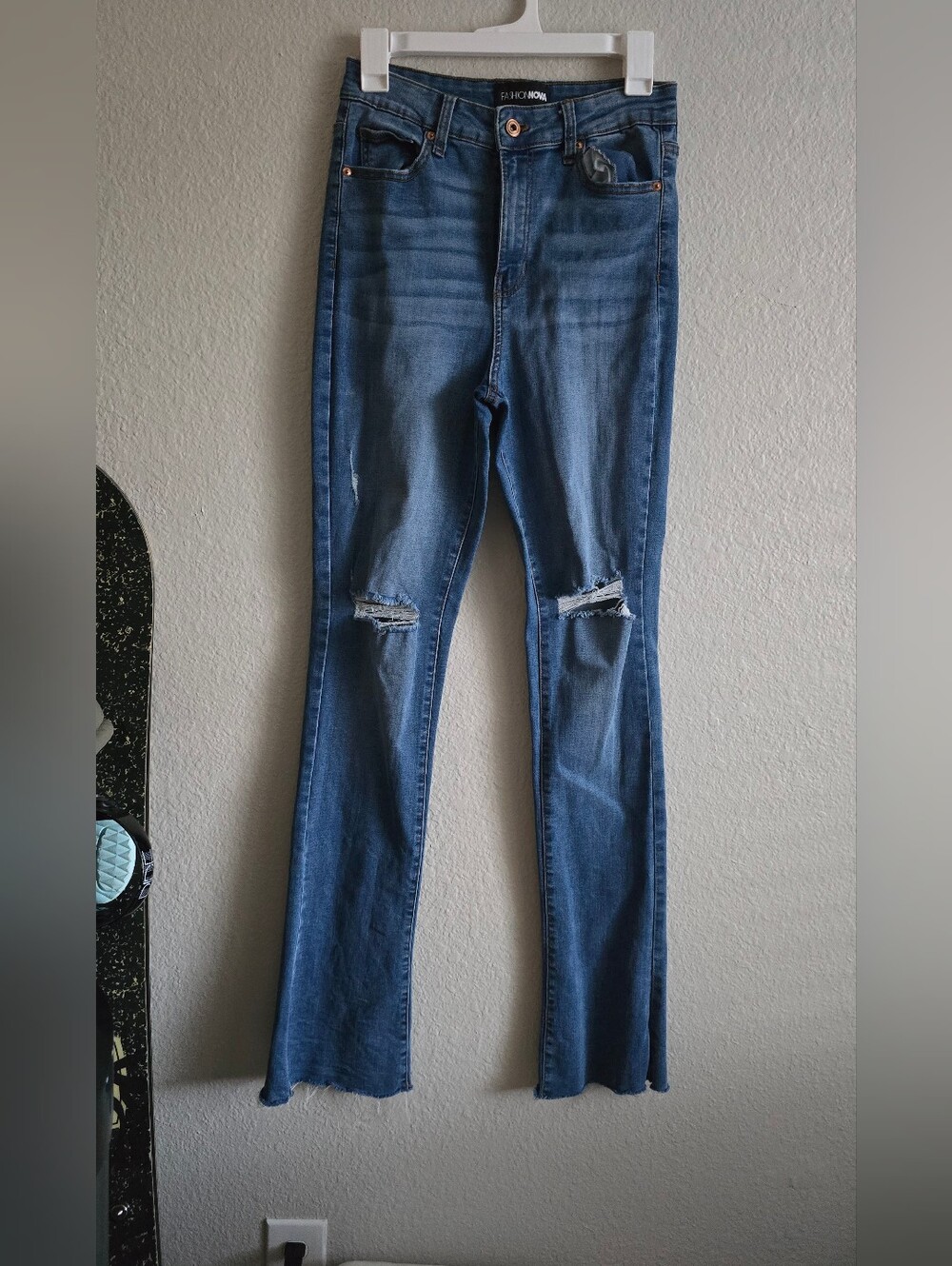 Fashion Nova Distressed Flare Jeans in Blue